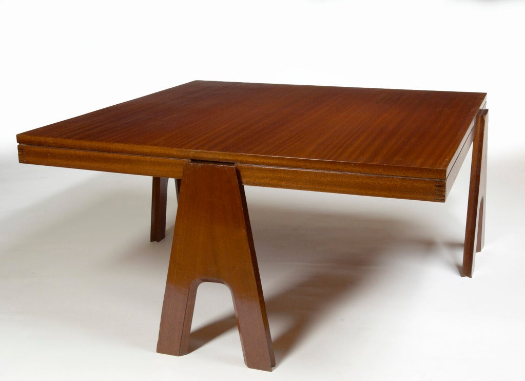 Angelo Mangiarotti (1929-2012).
A rare Angelo Mangiarotti modular component coffee table in mahogany, designed in 1955. Signed on base.

Measures: 37 x 37 x 18 H.