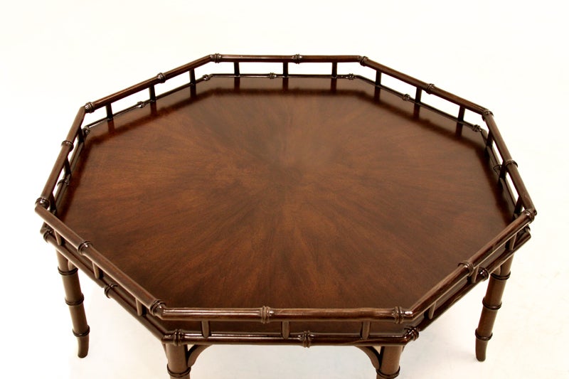 Beautiful walnut cocktail table with faux bamboo motif by Widdicomb.

Many pieces are stored in our warehouse, so please click on 