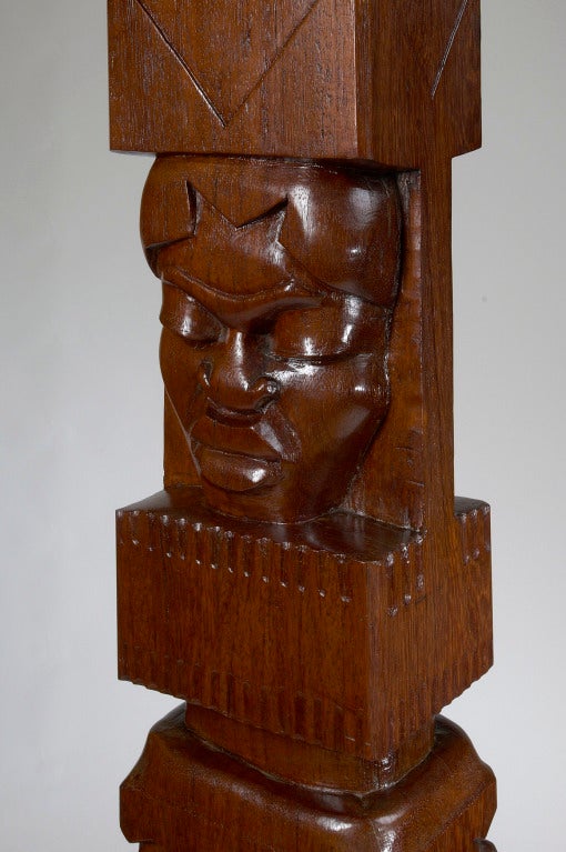 Charles Alphonse Combes (1891-1968)
An exceptional carved stele in solid palmwood, in the Africanist style of the 1931 Paris Exposition Coloniale.
Carved on both sides.
Measures: 62 H x 8 x 10.