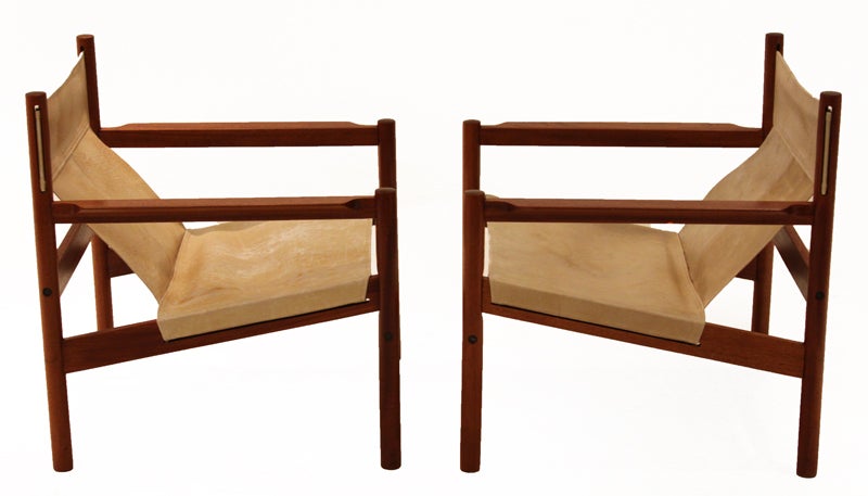 Brazilian Pair of Roxinho wood leather sling chairs by Michel Arnoult