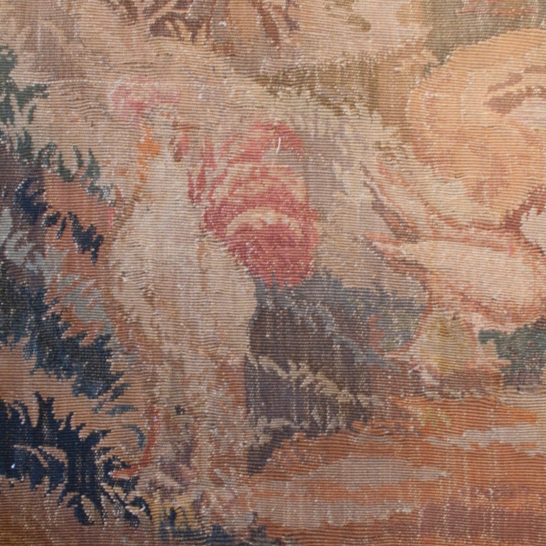 A 19th century French Aubusson carpet depicting a rooster and a hen in a natural landscape of flowers and trees. Can also be hung as tapestry. Measure:6'8