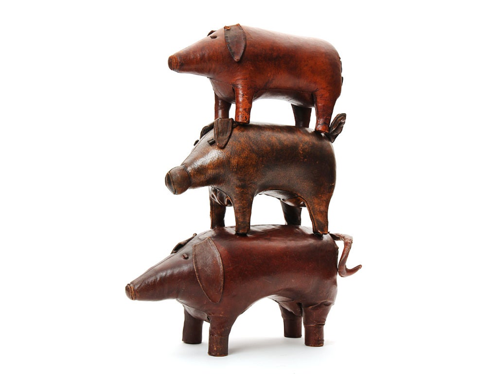 An ottoman in the form of pig with the original natural leather. 
Only largest available.
