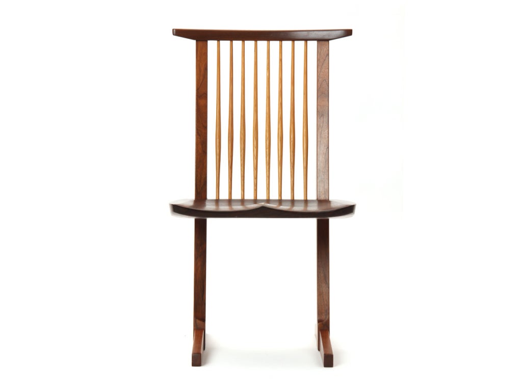 A 'conoid' walnut dining chair with hickory spindles and a rare one-board solid walnut seat. Signed 