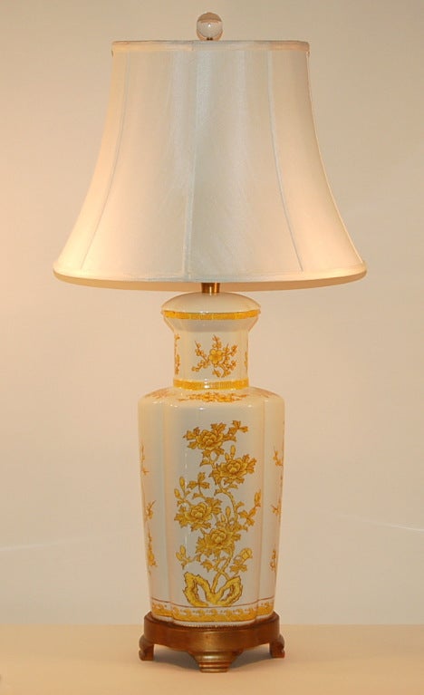 Beautiful pair of hand painted Imari porcelain lamps by Marbro, 1969.  These lamps are so perfect in every detail - hard to believe they are over forty years old.  Colors are HARVEST GOLD over WHITE.  

The gold leafed footed bases are
