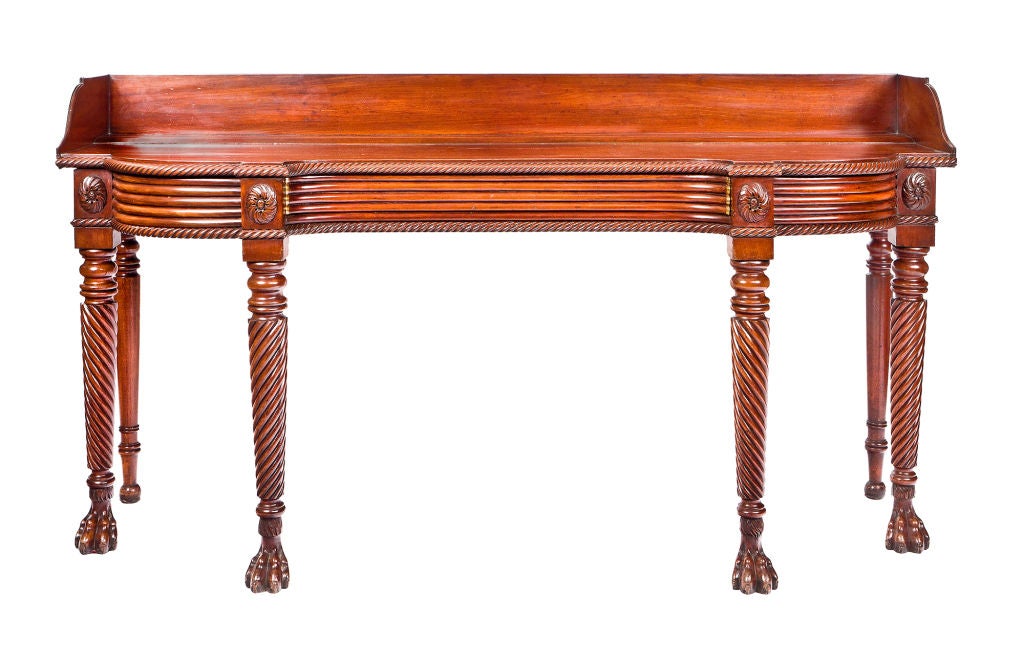 Irish Regency mahogany serving table with brass tipped drawer.
Probably from cork.