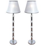 Pair of chrome and glass ball floor lamps