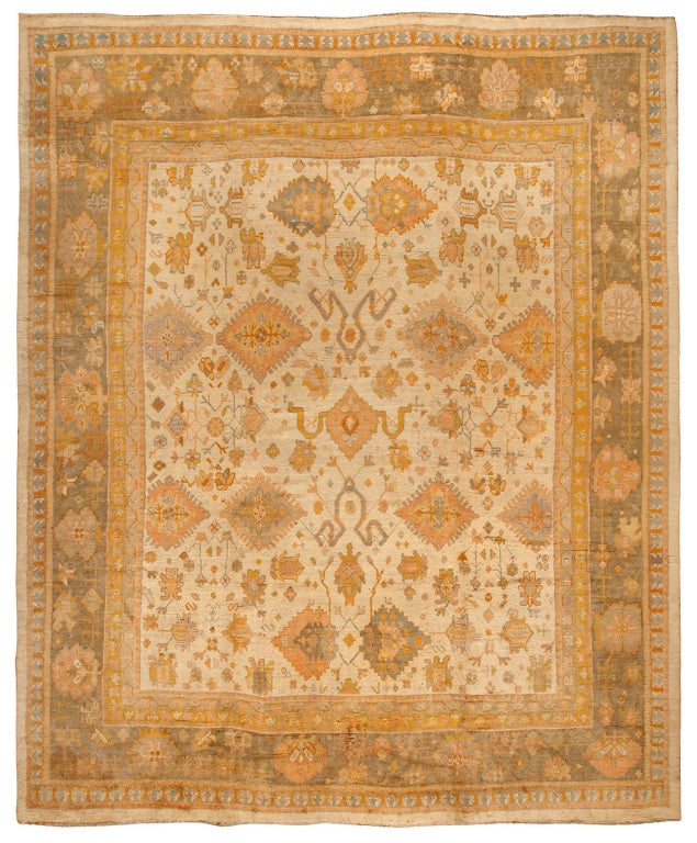 Antique Oushak carpet. 

Measures: 17 x 13.7.