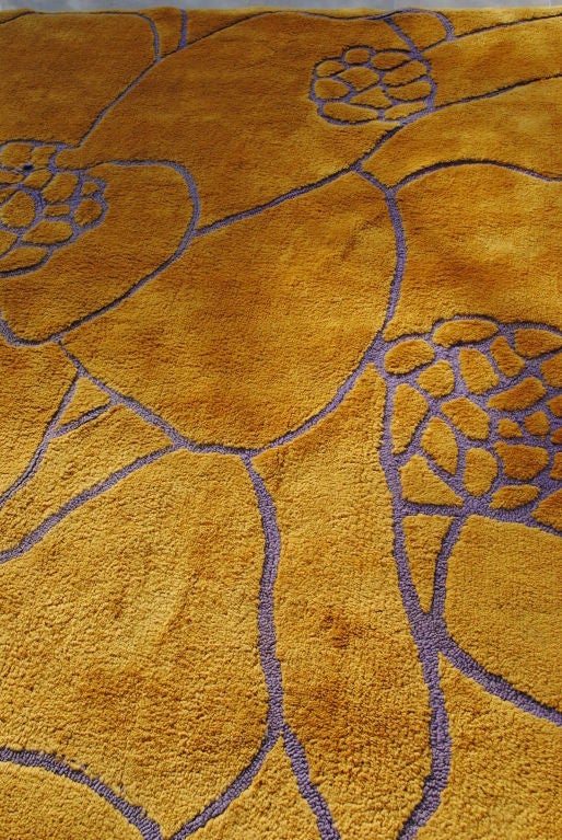 A Magnificent one of a kind Wolfgang Otto Bauer, for Knoll International. Bauer is known for his extraordinary flatware designs for Knoll. This glorious rug when in different lights, transforms from apricot to curry with wonderful designs in blue