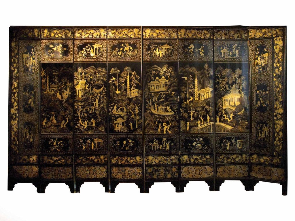 Chinese black lacquered and gilt decorated 8 panel screen made for the export market. Lacquer was invented and perfected by the Chinese. The wood panels are applied with many layers of lacquer, (made from the sap of the Rhus Vernicifera), each one