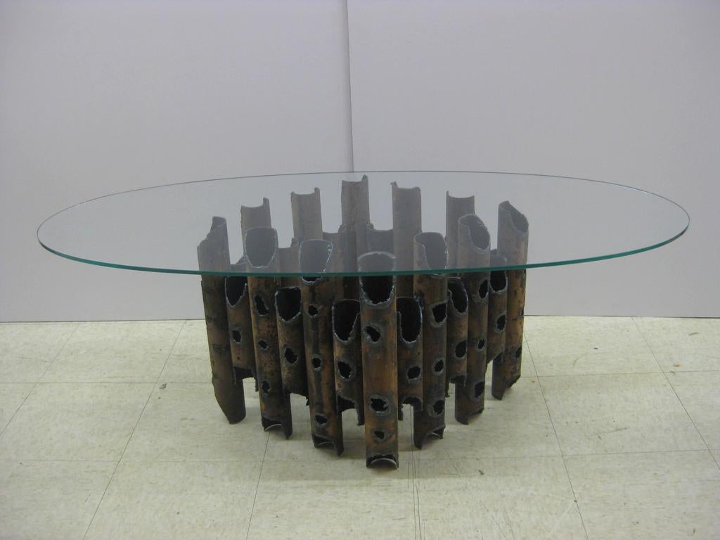 Brutalist cathedral cocktail table after Silas Seandel and reminiscent of some Paul Evans work, will provide 1/4 oval, round, square or rectangular glass to your specs, all inclusive, 1/2 inch and 3/4 also may be available. 
