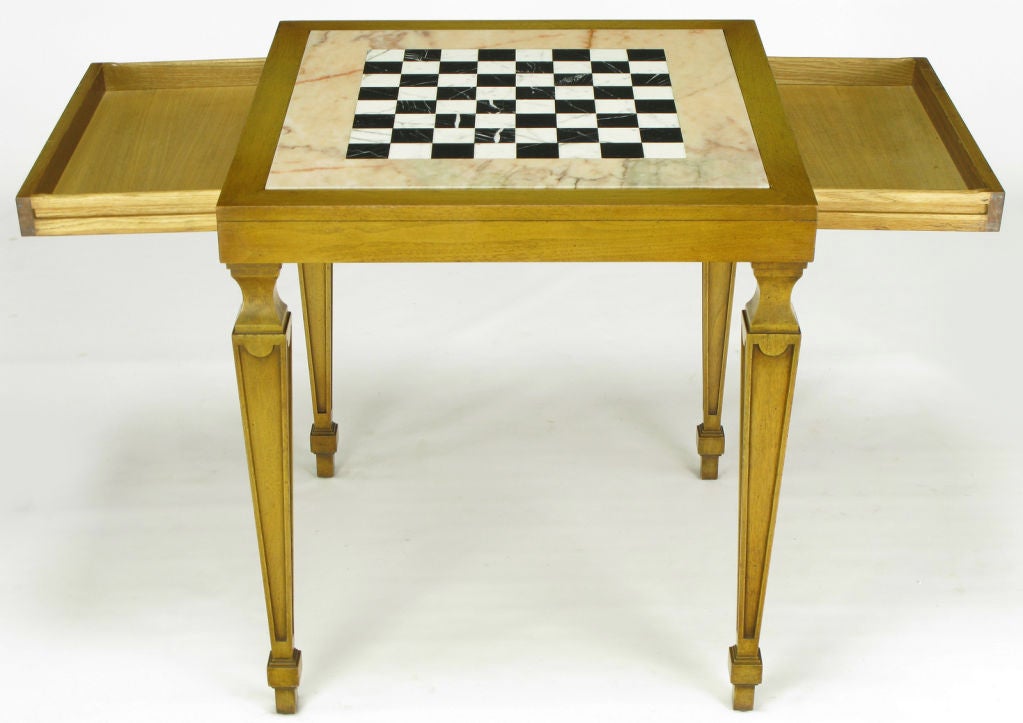 Bleached and glazed walnut French regency style game table with a pair of side drawers. Uncommon marble inlaid top of creamy rouge veined marble surround with black and white Italian carrera marble checker board inlaid center.

marble game board