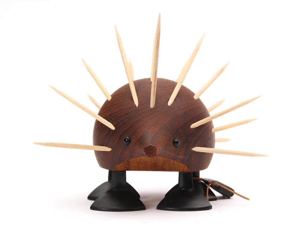 A teak toothpick server in the shape of a porcupine. Retains original Laurid Lønborg tag on leg (shown).