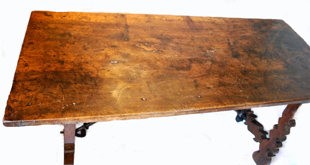 Excellent 17th Century Spanish Table with a single plank of Walnut top. Lovely wrought iron stretcher and lyre legs.











Haskell Antiques-Specializes in rare 16th, 17th, 18th Century Italian, Spanish, French, Syrian, Moroccan,