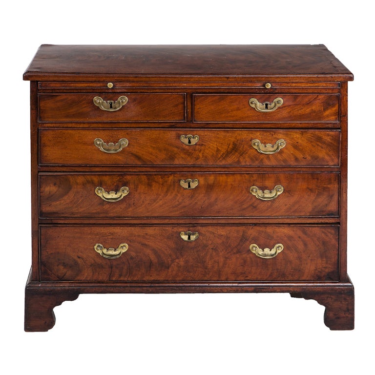 18th century Mahogany chest with pullout shelf and graduated drawers.