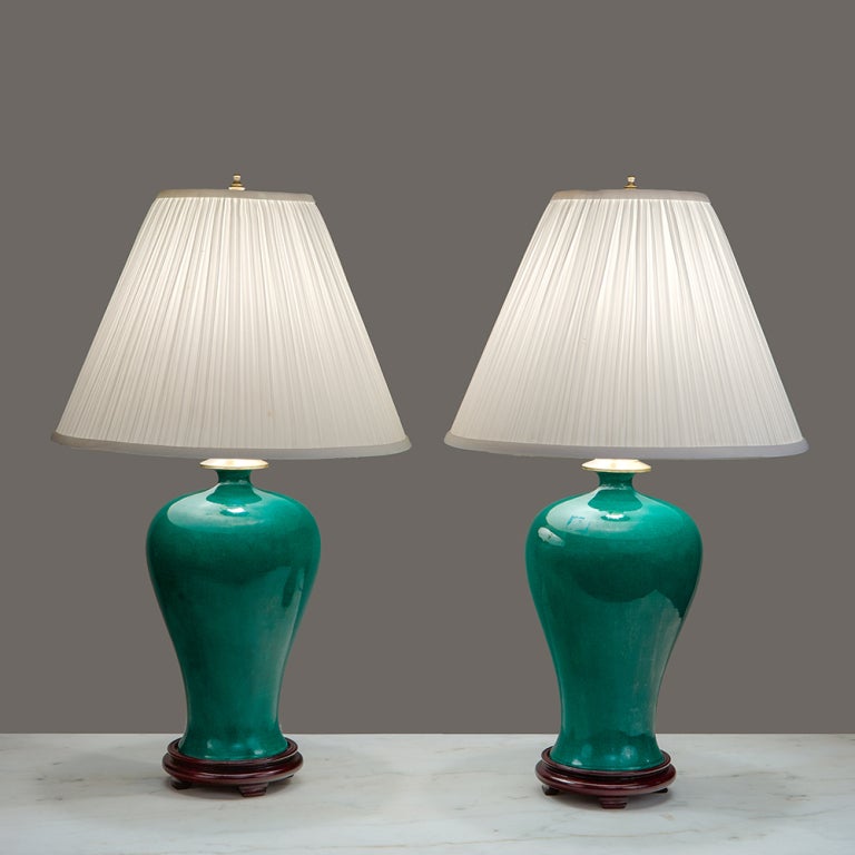 Pair of green porcelain Chinese Mei Ping lamps.
*(Shades not included)