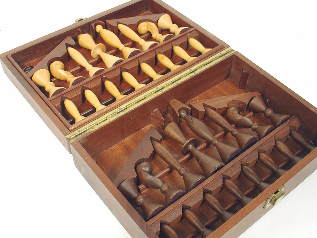 Modernist Chess Set, designed by Arthur Elliot for ANRI of Italy. This is the "Space Age" model set and retains it's custom fitted box with a top shelf insert to hold all the pieces. Arthur Elliot worked as an animator for Disney Studios