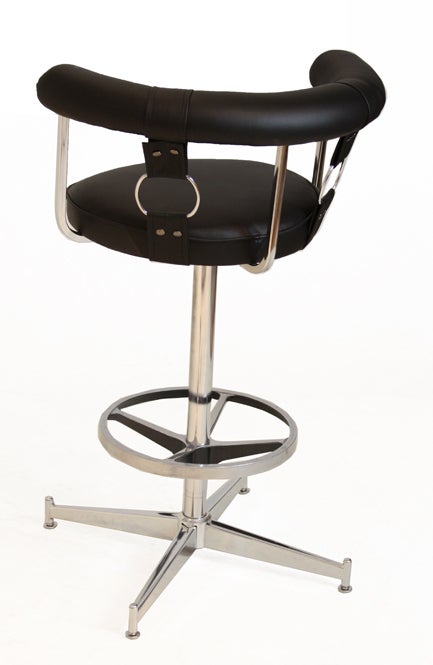 Mid-20th Century Set of 3 black leather and chrome swivel bar stools