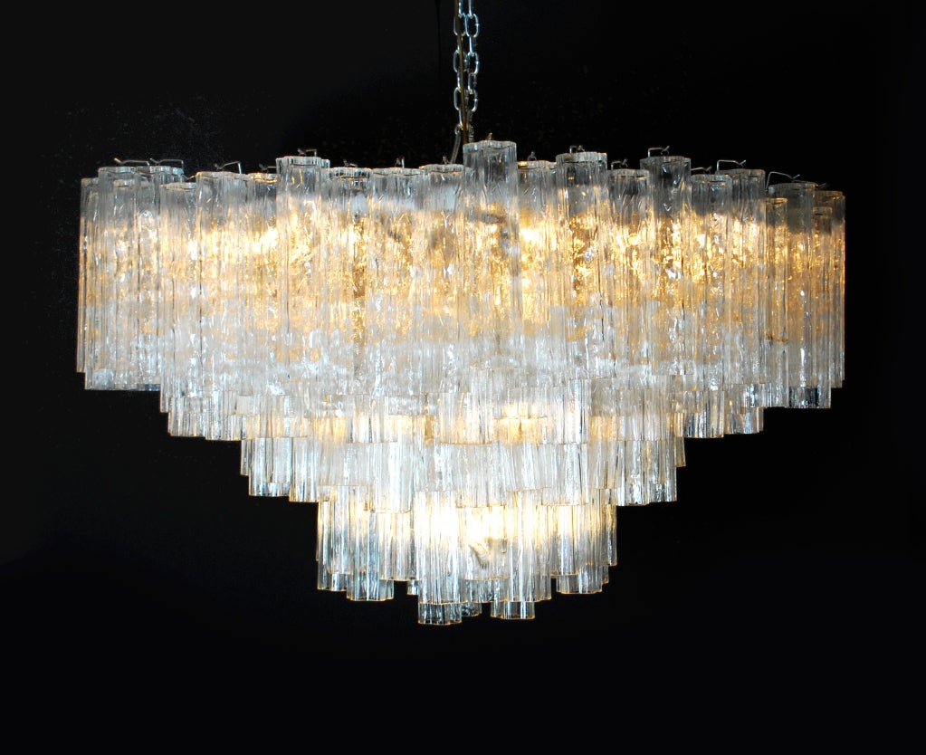 DESIGNER & MANUFACTURER: Camer

MARKINGS: none

COUNTRY OF ORIGIN & MATERIALS: Italy; glass, metal

ADDITIONAL INFORMATION: Monumental blown glass chandelier by Camer. Beautifully designed, elegantly crafted work with over one hundred and