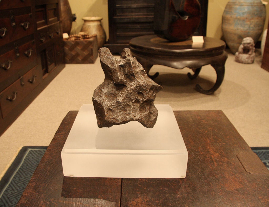 Campo del Cielo meteorite (Iron, coarse octahedrite). Discovered in Gran Chaco Argentina, the meteor was first reported in 1576 by a Spanish governor who learned of the iron from Indians believing that it had fallen from heaven. Since that time,