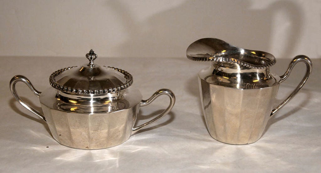 Sterling Silver A STERLING SILVER TEA AND COFFEE SERVICE. MEXICAN, CIRCA 1950