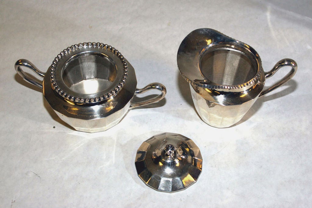 A STERLING SILVER TEA AND COFFEE SERVICE. MEXICAN, CIRCA 1950 1