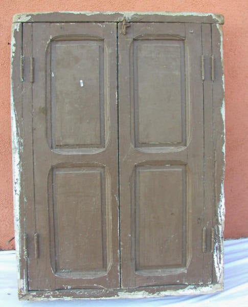 Antique Window from Essaouira Circa 1900
Unique 3 dimensions Moroccan Window:
Iron Screen, glass window and wood panels.
Size: H 35