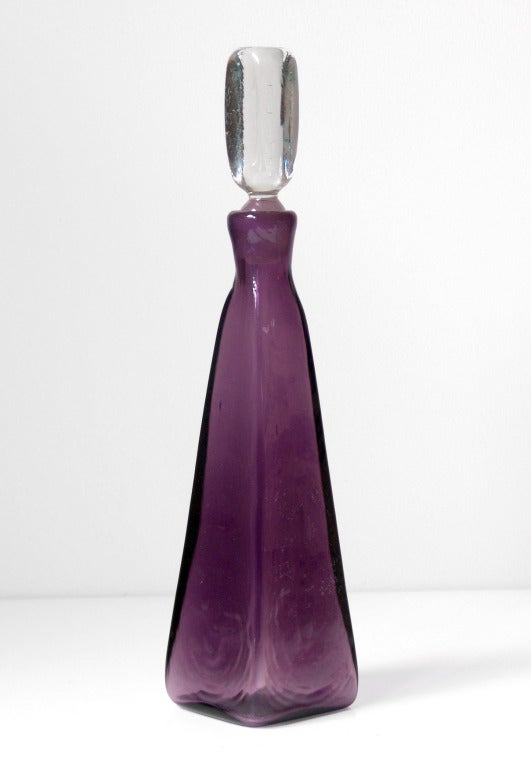 ______
(Items also available individually, please email to inquire.)


LEFT: Pyramidal or obelisk form decanter with solid rectangular crystal stopper, designed by Wayne Husted in 1960, made for 2 years only. Design #604 in Lilac, pictured in