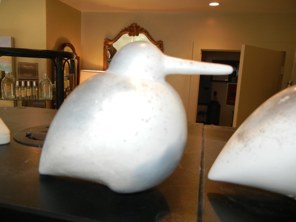 Three sculptural studio crafted sandpipers.The large one is
8'x 7'x 5'the two smaller ones are approximately 6'x 4'x 3'
The unusual natural colors are due to the pit firing process,the birds sit close to the flames around a pit fire,leaving them