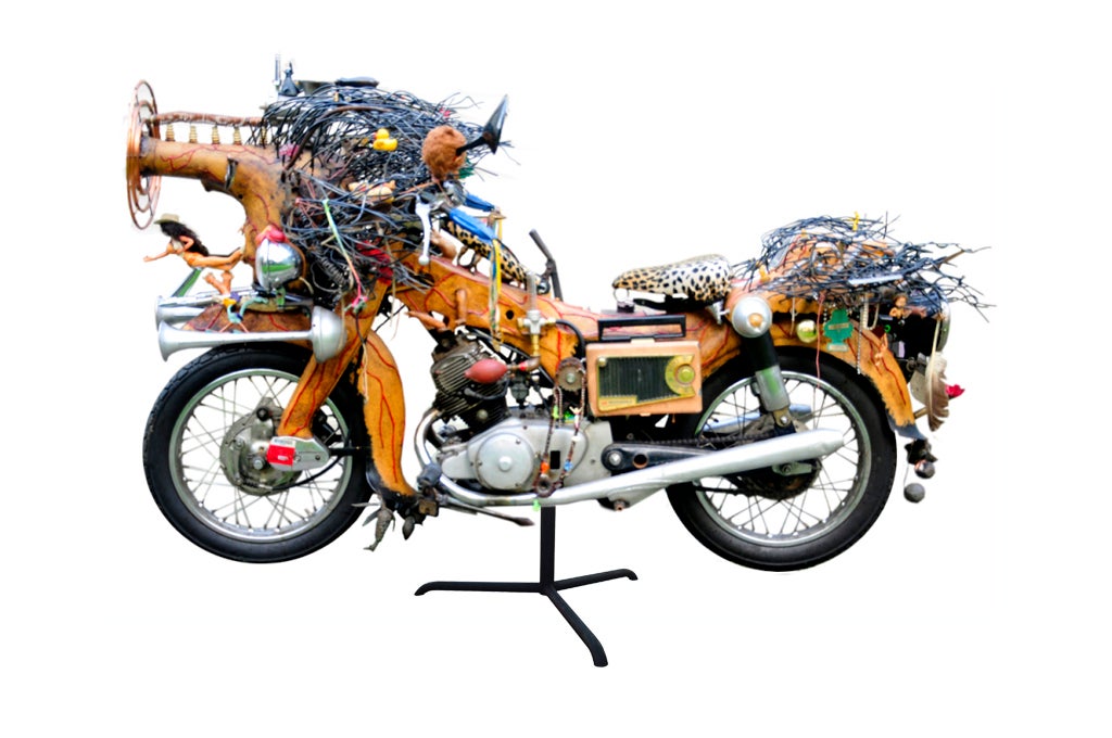 This amazing sculpture is also a working motorcycle. You can stare at it for hours and still discover new things. The bike was originally a 1965 160c.c.  Honda 