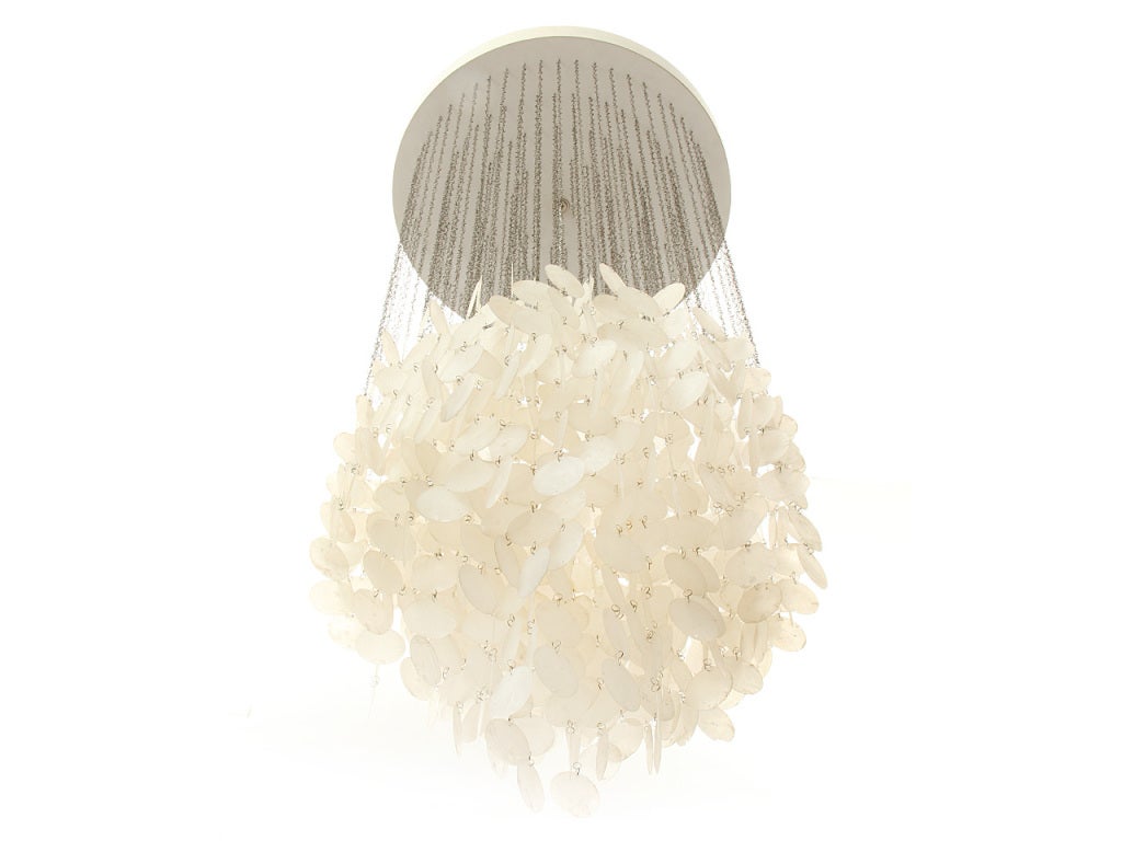 A ceiling fixture with a circular white laminate canopy from which numerous capiz shells are hung.
