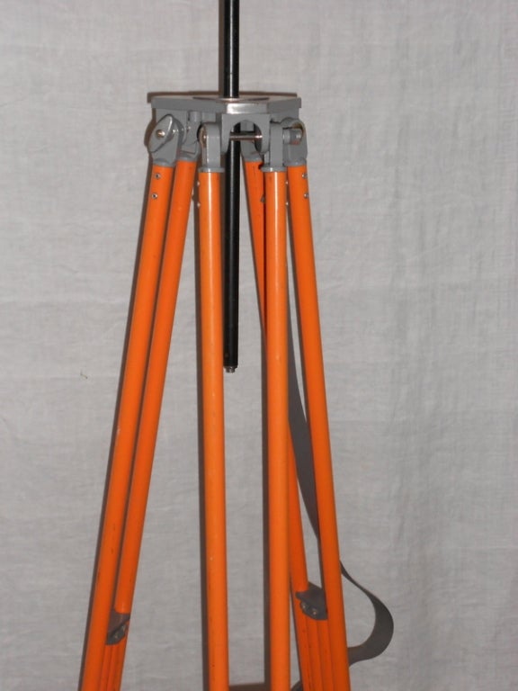 American Surveyor Tripod of Orange-Painted Steel as Adjustable Floor Lamp