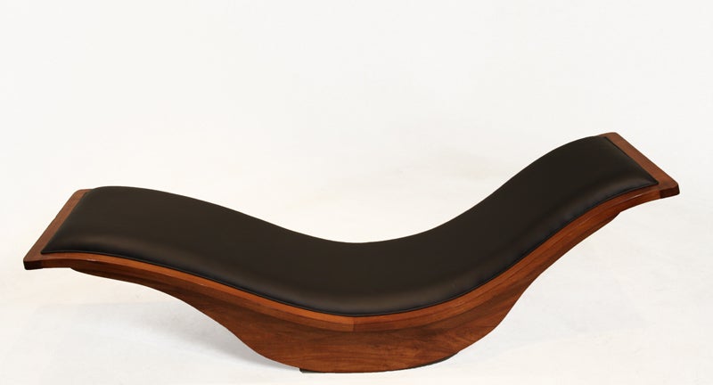 This Brazilian designer has designed a swooping rocking chaise lounge composed of exotic hardwood with a black leather seat. The design is sleek and incredibly comfortable.

Many pieces are stored in our warehouse, so please click on CONTACT