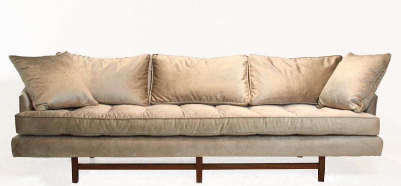 Beautiful bronze silk velvet sofa with Walnut base and down stuffed cushions. This piece, done in the manner of Harvey Probber, was found in a Beverly Hills estate. This sofa is unique in that no stretchers were used for the sofa base as seen in the