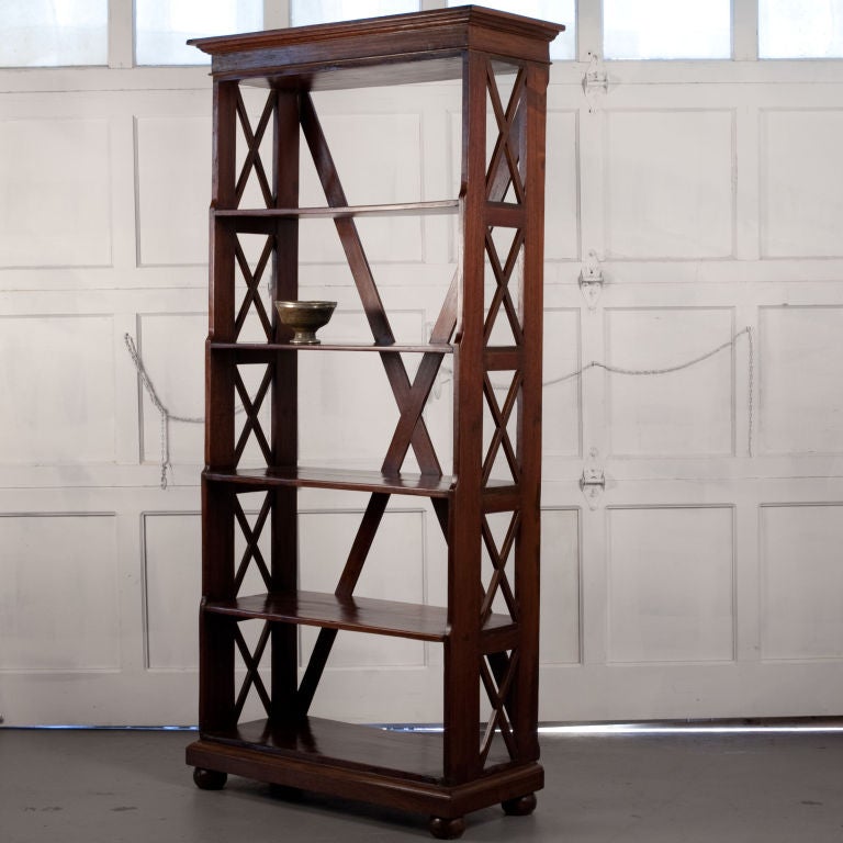 Anglo-Indian  solid teak bookcase with cross brace sides and back.