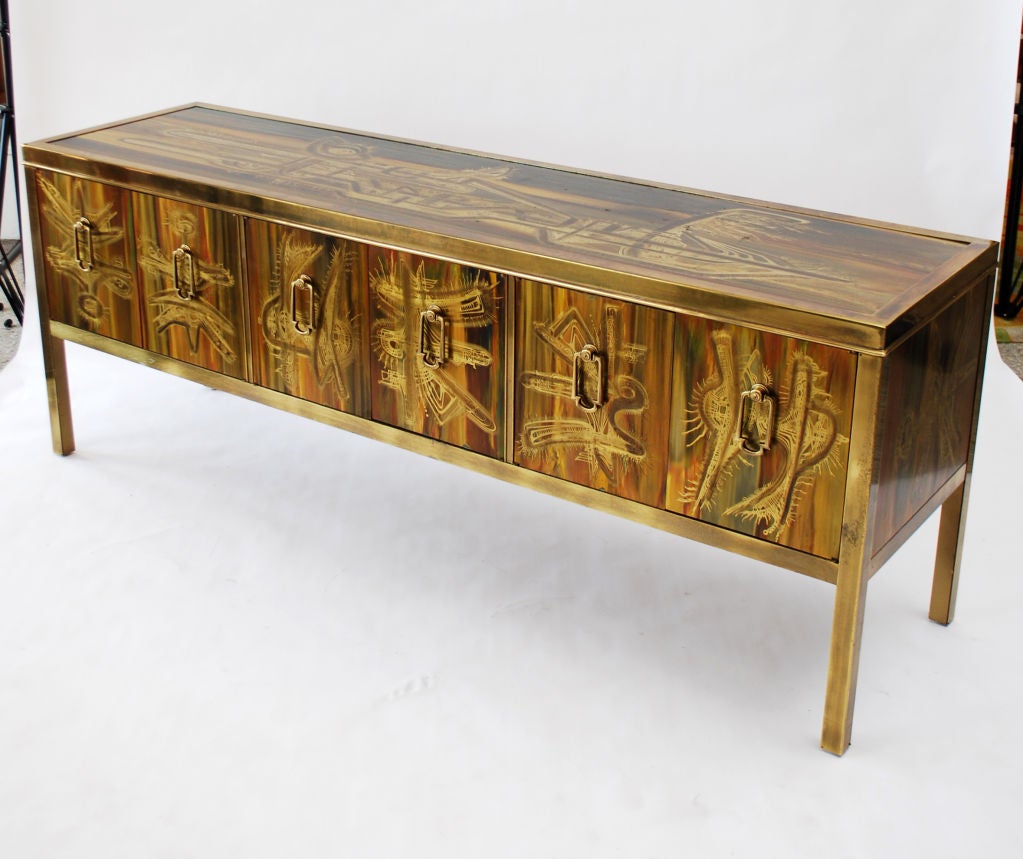 Fine acid etched brass server/cabinet/buffet/credenza with 6 doors revealing 3 storage spaces with brass pulls by Bernhard Rohne for Mastercraft. Beautiful and unique acid etched detailing on the front, top, & sides. 

*Notes: There is no sales