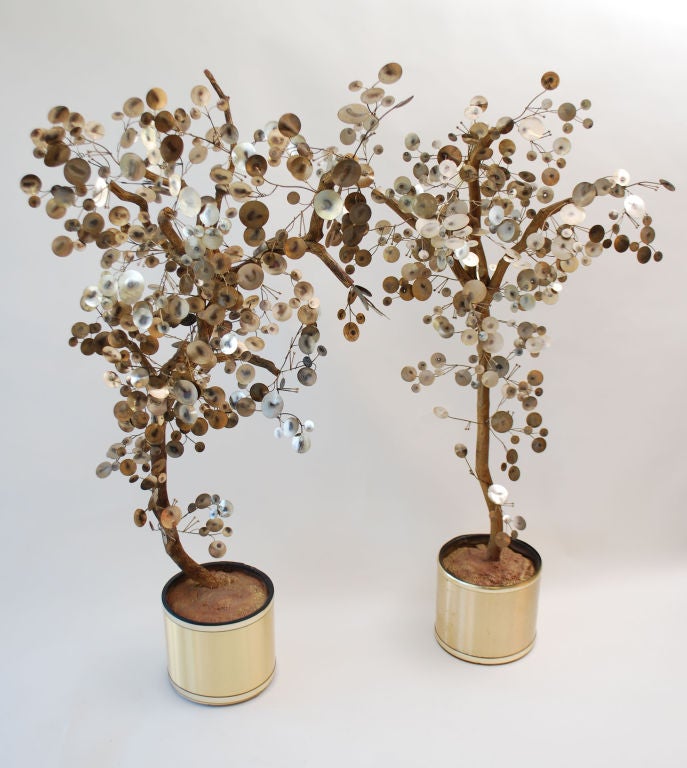 Pair of brass raindrop tree sculptures attributed to Curtis Jere.  Priced for the pair.  *Notes: There is no sales tax on this item if it is being shipped out of the state of Florida (Objects20c/Objects In The Loft will need a copy of the shipping