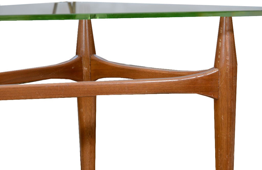 1960s Italian walnut tripod end table in original condition in the manner of Gio Ponti.