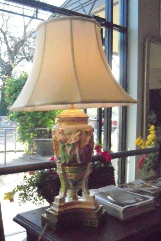 Pair of Capo di Monte porcelain lamps from a famous Italian designer. Hand painted; 24K gold. Shade dimensions: 13
