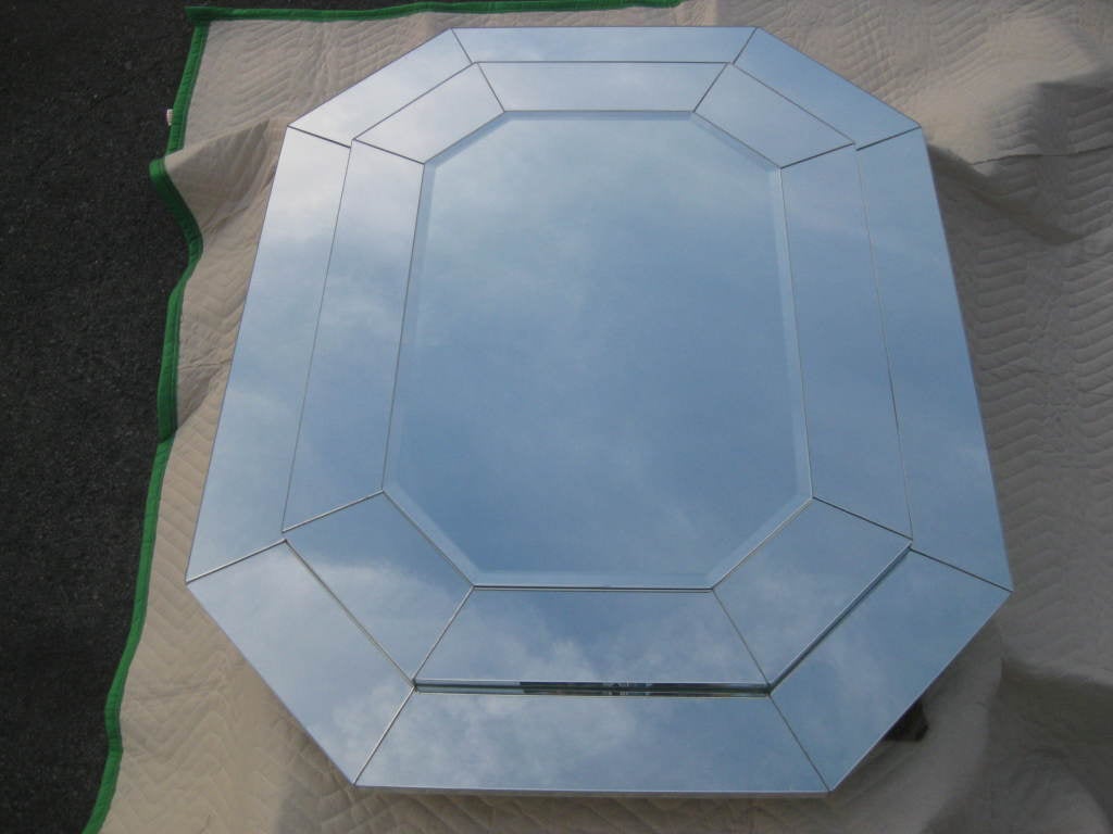 Single modern elongated octagonal step mirror, the image above is of original sold piece, please see thumbnail for new pieces fabricated by us for custom orders, we provide rentals for stylists, photo shoot and props for movie sets.