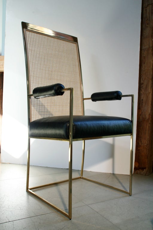 Set of 6 dining chairs, designed by Milo Baughman, USA c. 1970s. Mint restored condition with newly re-plated frame in polished brass, New Danish weaved caned back in natural finish, Newly reupholstered seat cushions and arm rests in Italian black