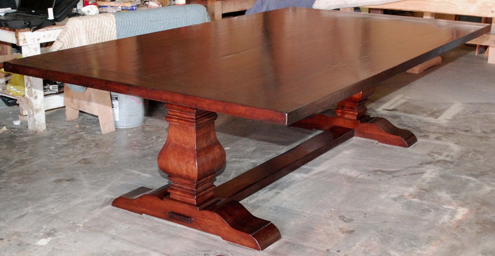 This massive dining or banquet table is made in solid, distressed cherrywood - the top is two inches thick! 

This table is fully collapsible for easy shipping and installation (see image #9, no tools required). 

Because each table is bench-made in