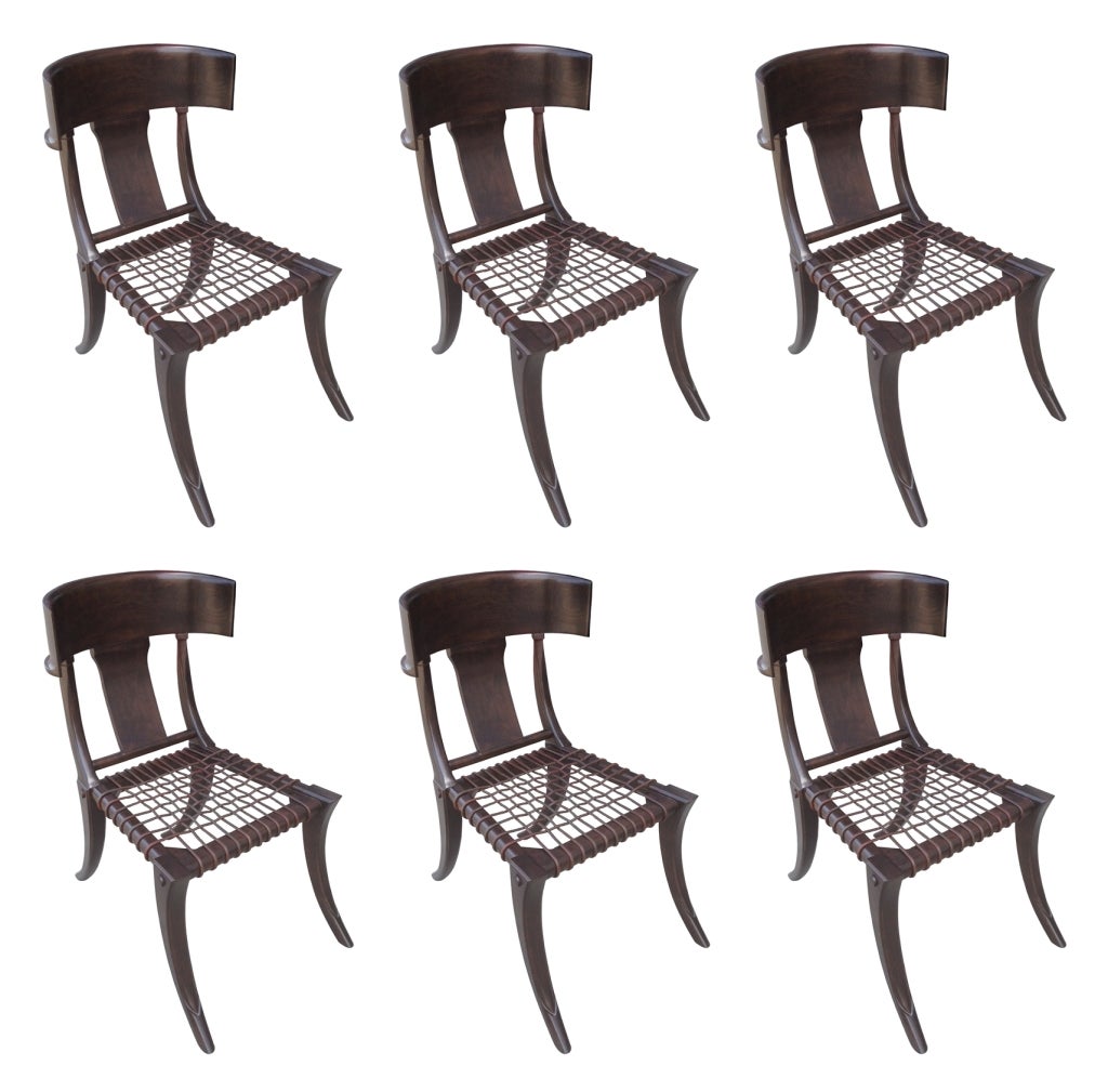 The chairs are made of solid alder wood with a beautiful webbing in the seat. The exaggerated curved legs are just stunning and add lots of presence to the chairs.
The chairs are in excellent refinished condition and are ready to be displayed.