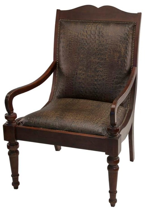 This sleek comfortable embossed gator safari chair will enhance your jungle decor or add mistique to contemporary.