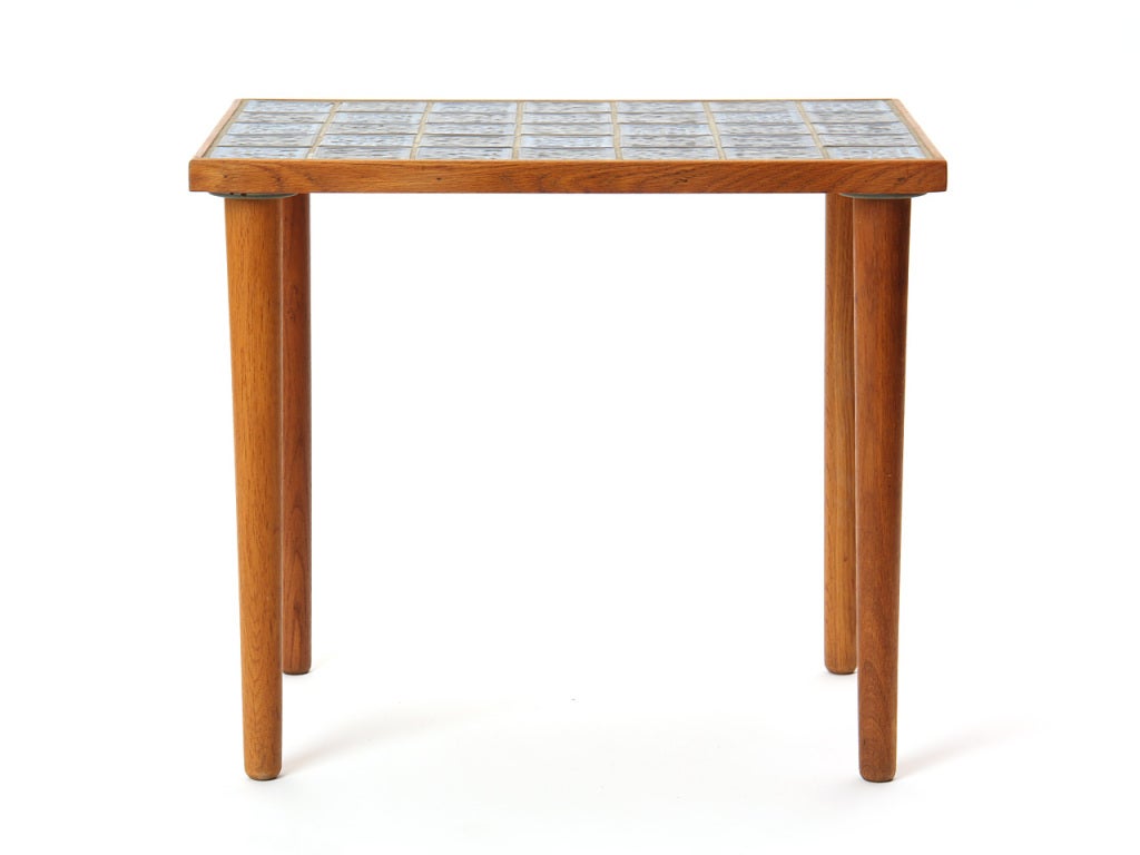 Blue tile on tapered teak dowel legs