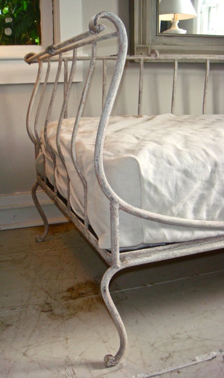 Beautiful French iron day bed with zinc accents. Has been rust treated to achieve this great chalky grey finish.