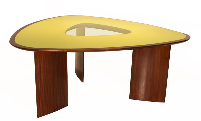 The iconic triangular dining table, 