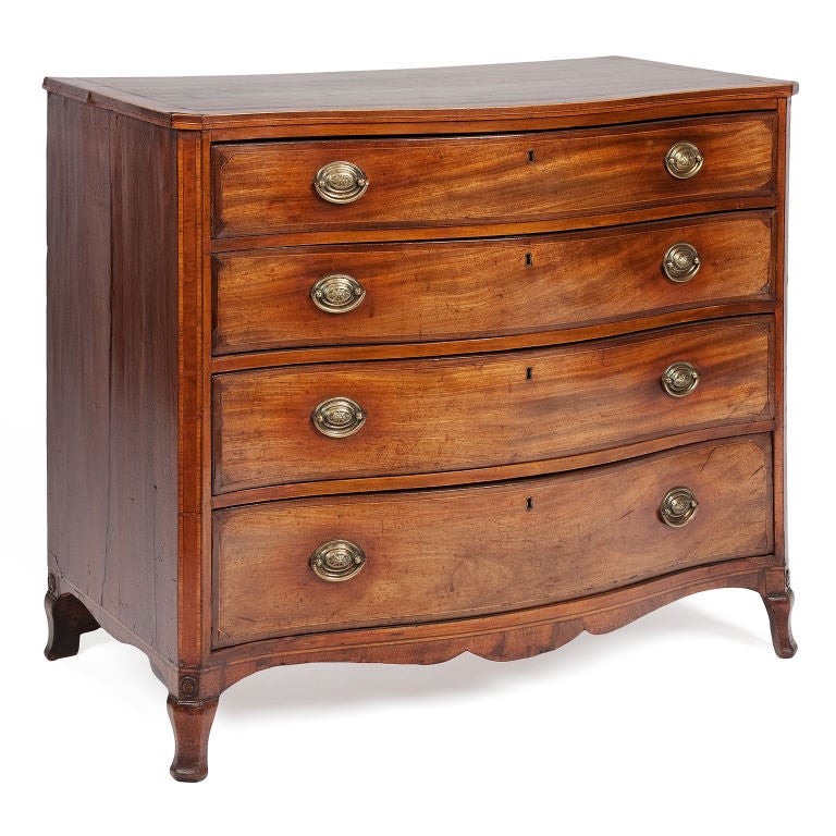 Early 19th century Irish mahogany serpentine chest of drawers.