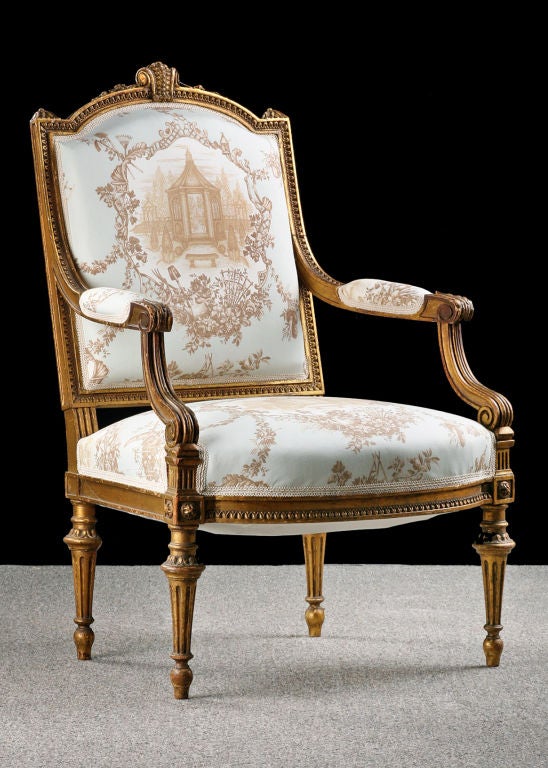 Pair of French Antique Louis XVI style Giltwood Armchairs, excellent quality with fine detailed carving. Recently reupholstered in chinoiserie toile de Jouy fabric.