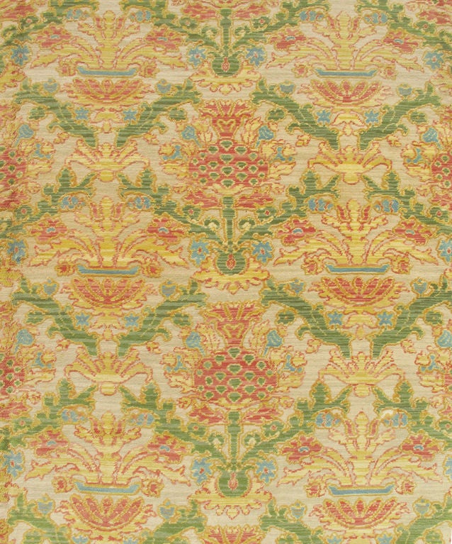 This magnificent Spanish Carpet with its stunning array of colors is upon a raised design of elegant beauty.  The slightly raised piles of colorful patterns that intricately weave throughout the entire field are accentuated by the ivory field that