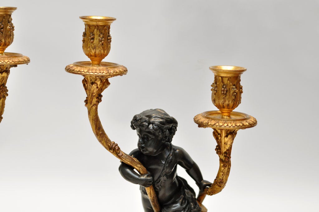 Patinated French Bronze Candelabras Infant Bacchus & Satyr after Michel Claude Clodion For Sale